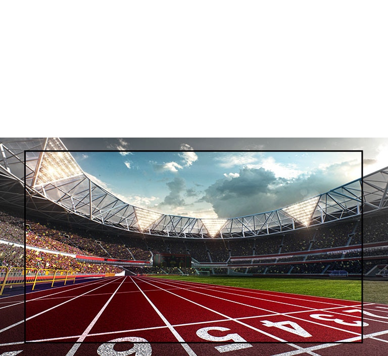 TV screen showing a stadium with a view of the running track up close. Stadium is filled with spectators.